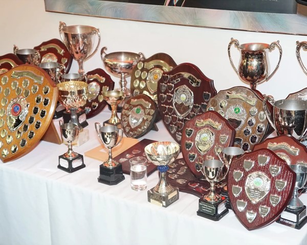 Rossborough celebrates winners at the Manx Hockey Association End of Season Dinner